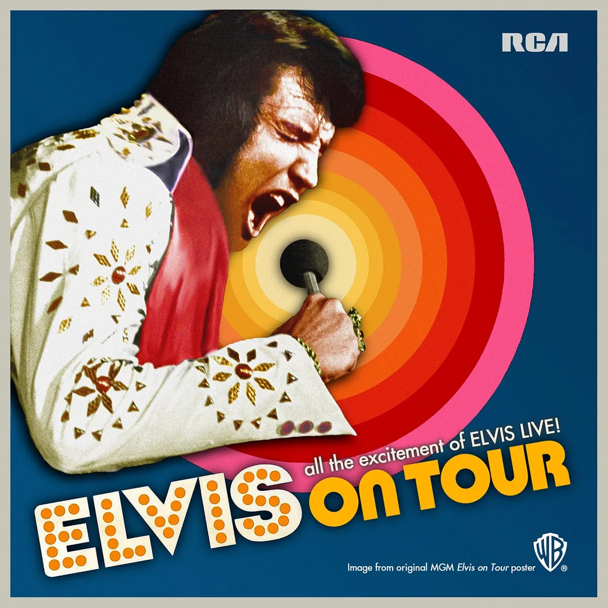 Elvis Presley performing live on stage during Elvis On Tour filming with band and backup singers