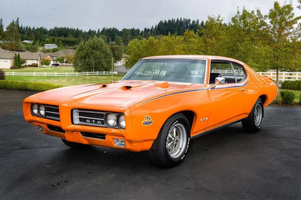 1969 Pontiac GTO Judge hardtop with bold stripe graphics and rear spoiler