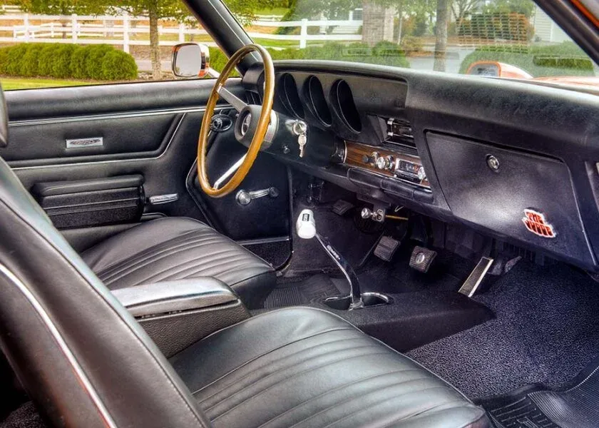 Front interior view of a 1969 Pontiac GTO Judge showing the cabin layout