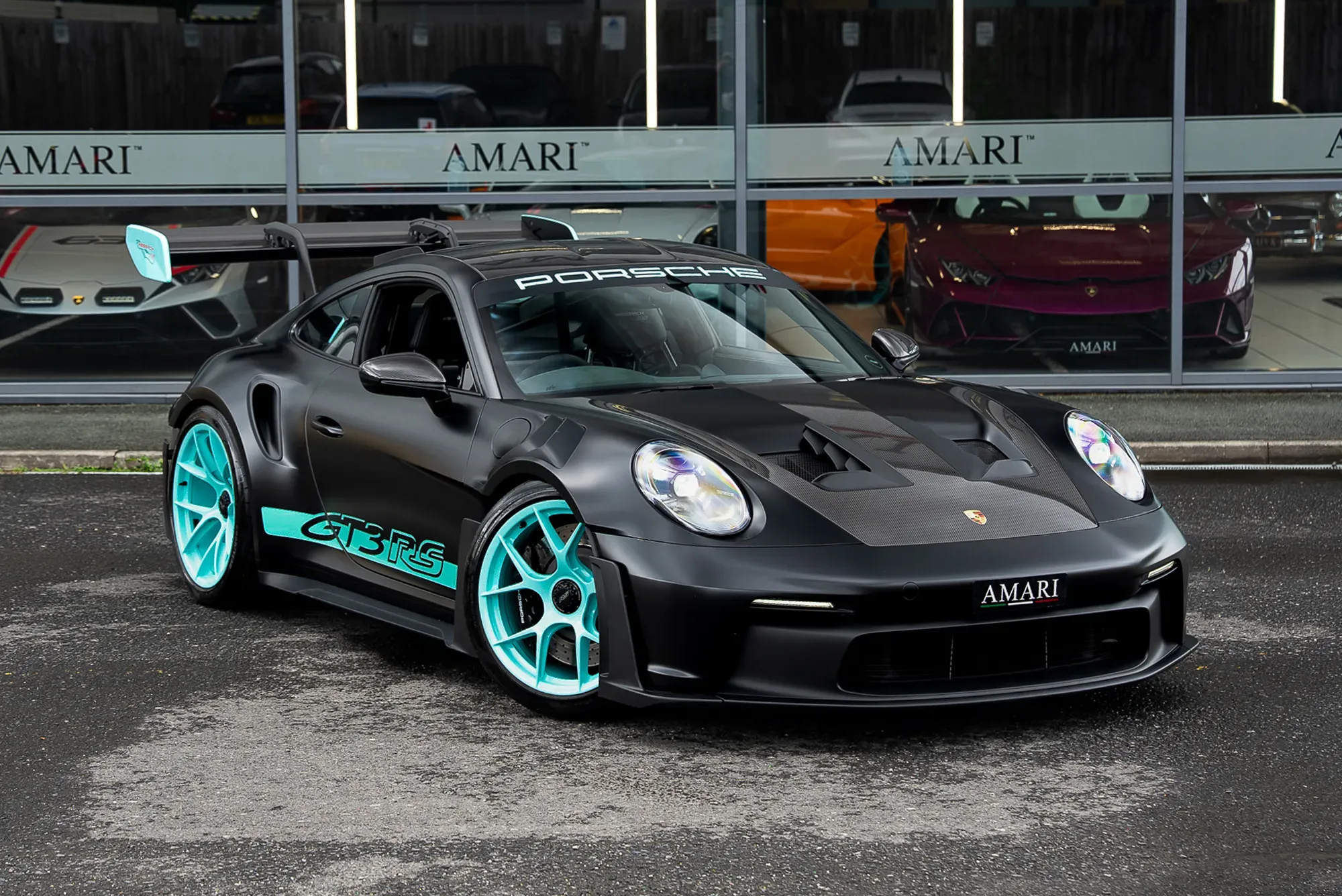 2023 Porsche 911 GT3 RS in black matte PPF at dealership display