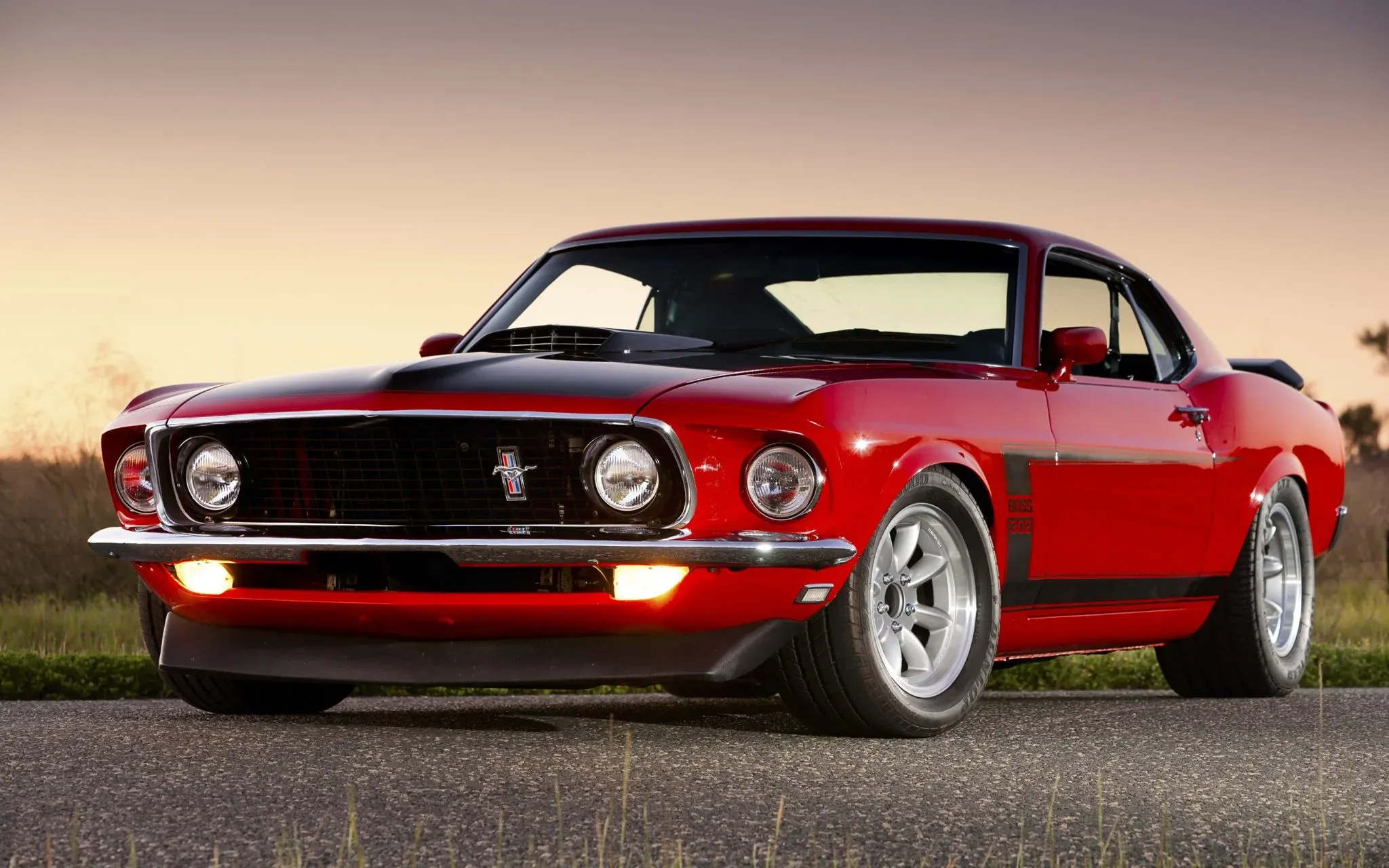 The 1969 Boss 302 with its bold side stripes and blackout hood