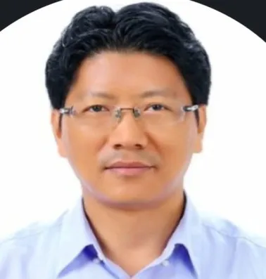Portrait of Dr. Anuj Bhattchan, Acting Director General of Health Services