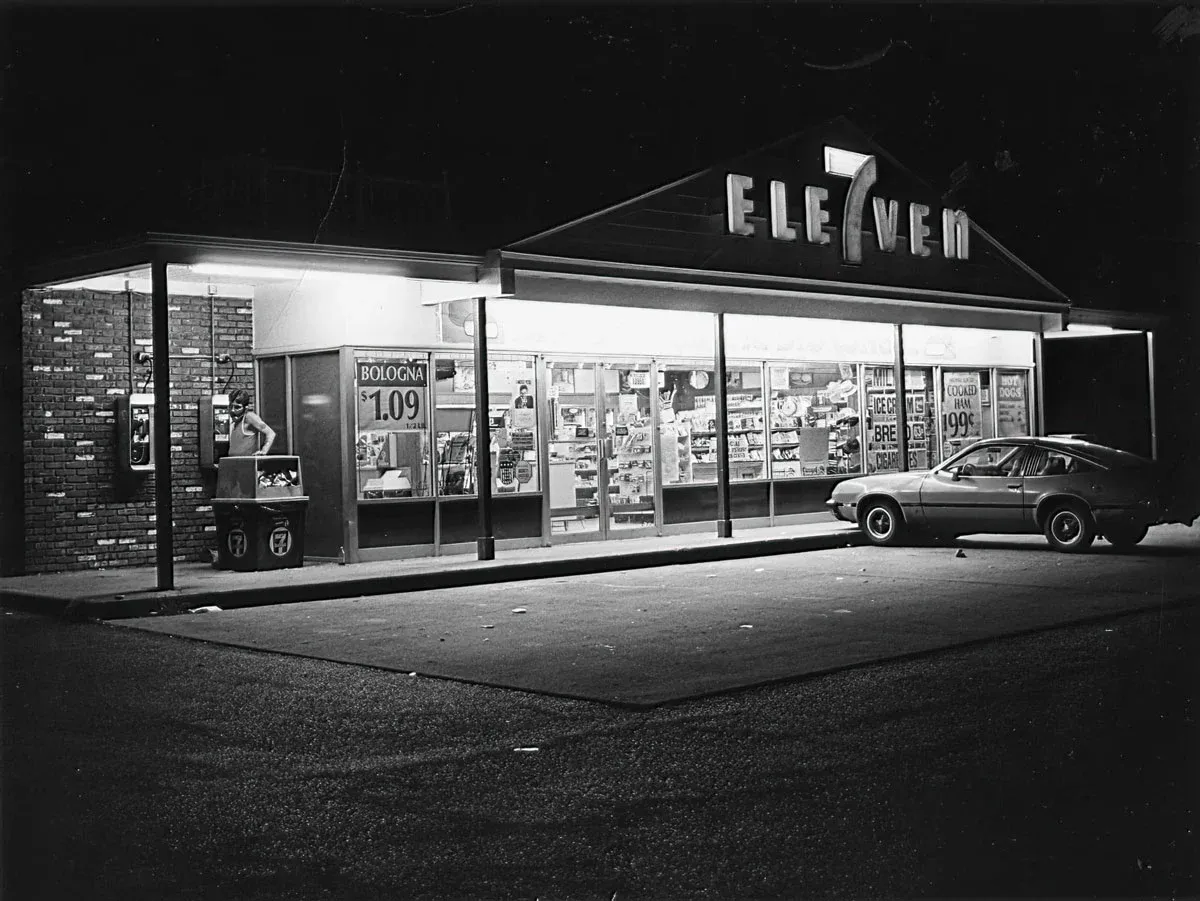 Black and white image of a 7-Eleven store in 1979 suburban America