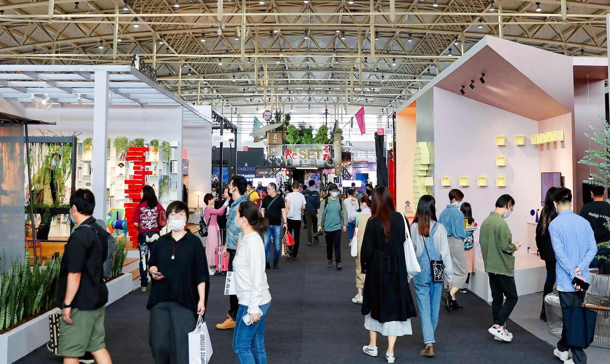 Architectural design exhibition featuring international designers and creative installations