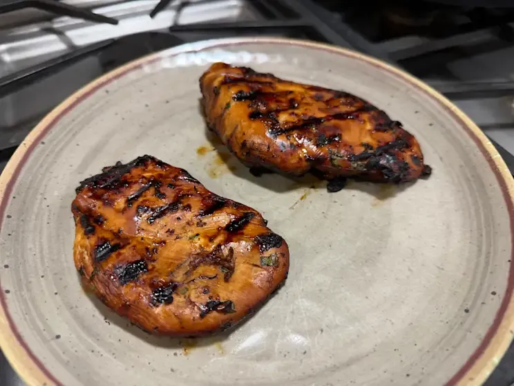 One-Pan Lemon Garlic Chicken with golden-brown thighs and fresh herbs