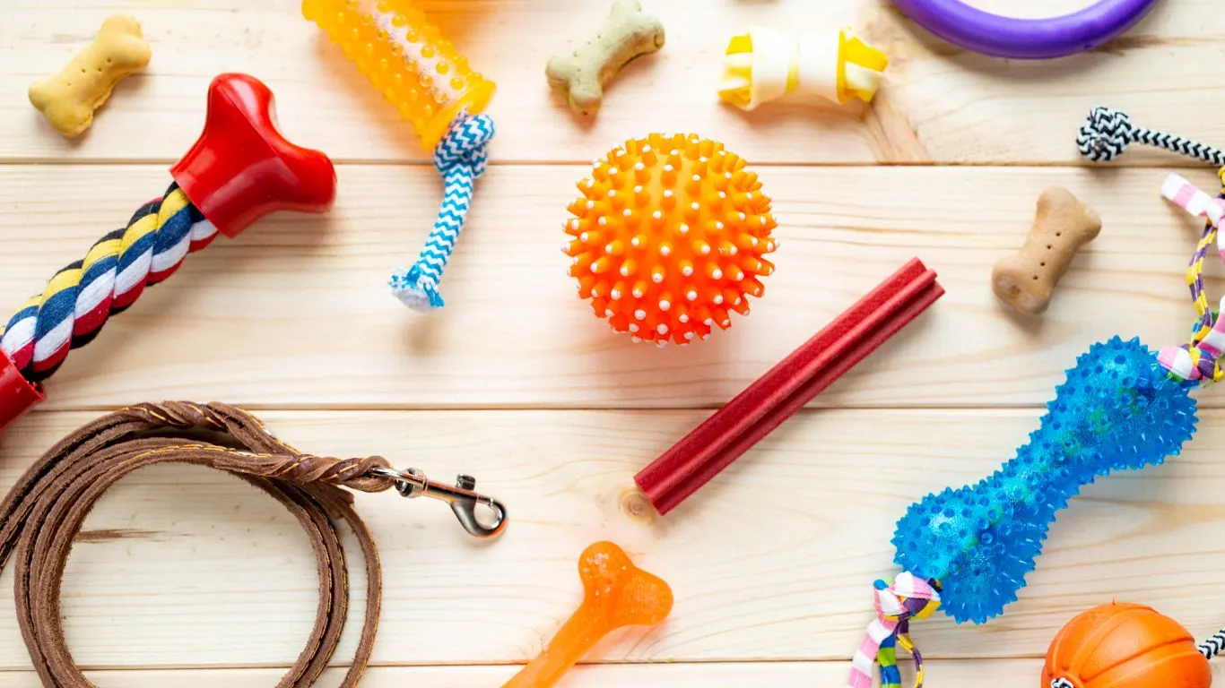 A variety of dog toys including rope toys, rubber balls, and durable chew options suitable for power chewers