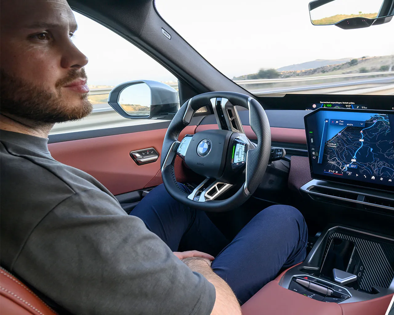 Split-screen view showing the Highway Assistant providing driving support