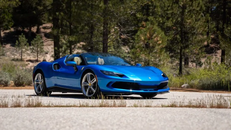 Ferrari 296 GTS near trees and pavement