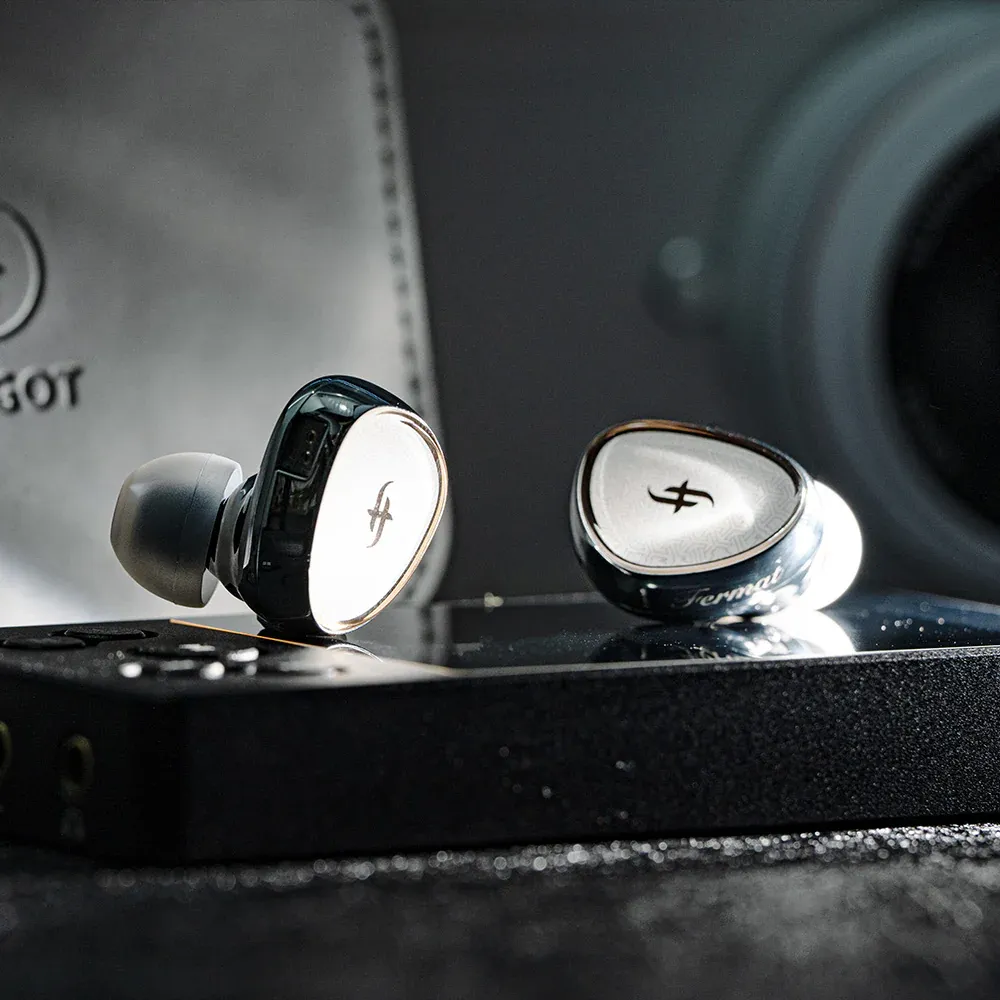 SIMGOT EA1000 Fermat IEM full view showing all-metal body and purple-gold diaphragm design