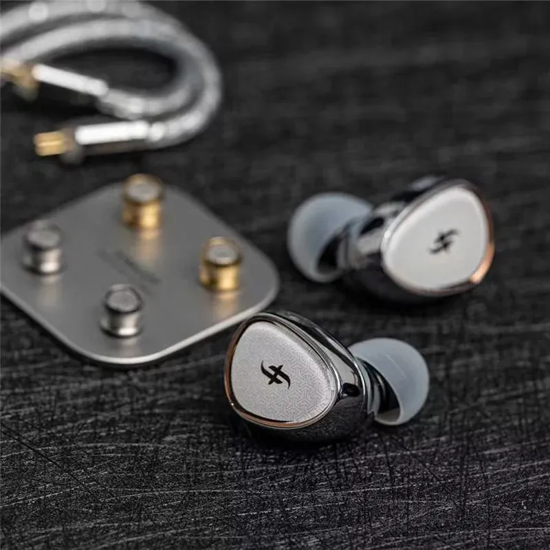 SIMGOT EA1000 Fermat three interchangeable nozzles including brass and stainless steel options displayed side by side
