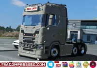 Euro Truck Simulator 2 truck driving through a scenic European highway at sunset