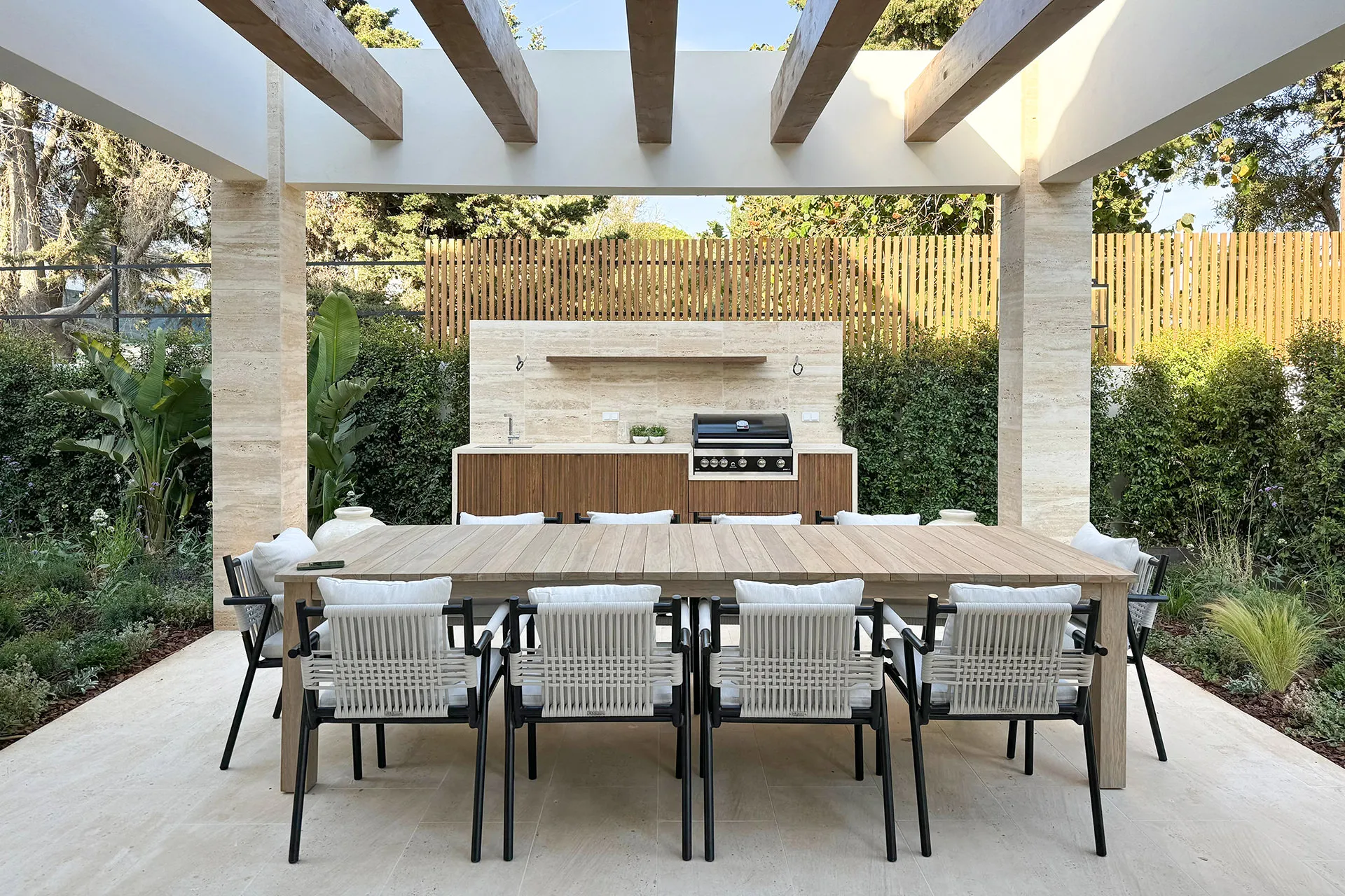Hampton outdoor dining armchair with woven rope detail and aluminium frame by G&G Italia