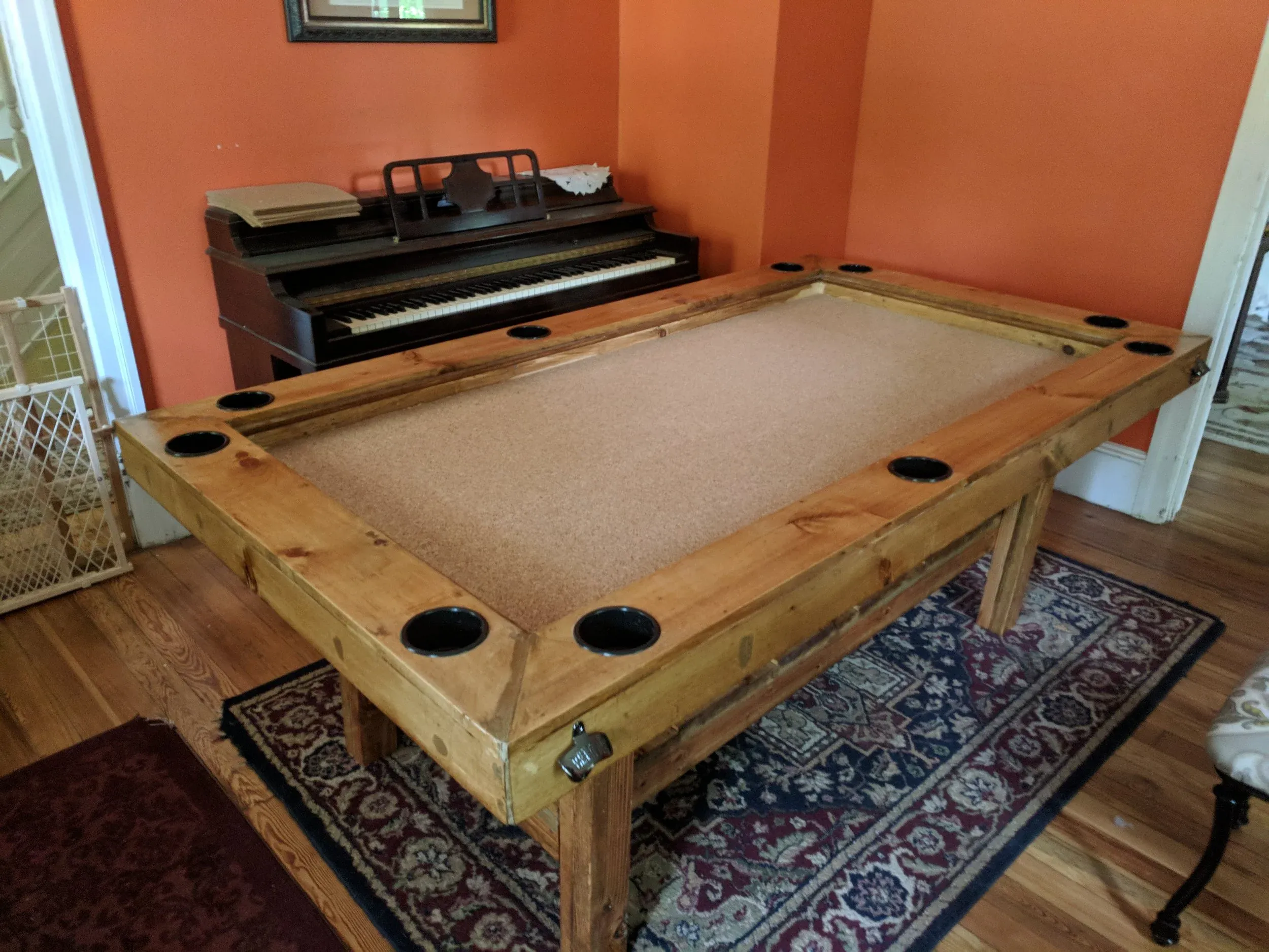 Cork-lined recessed play area designed for tabletop RPG sessions