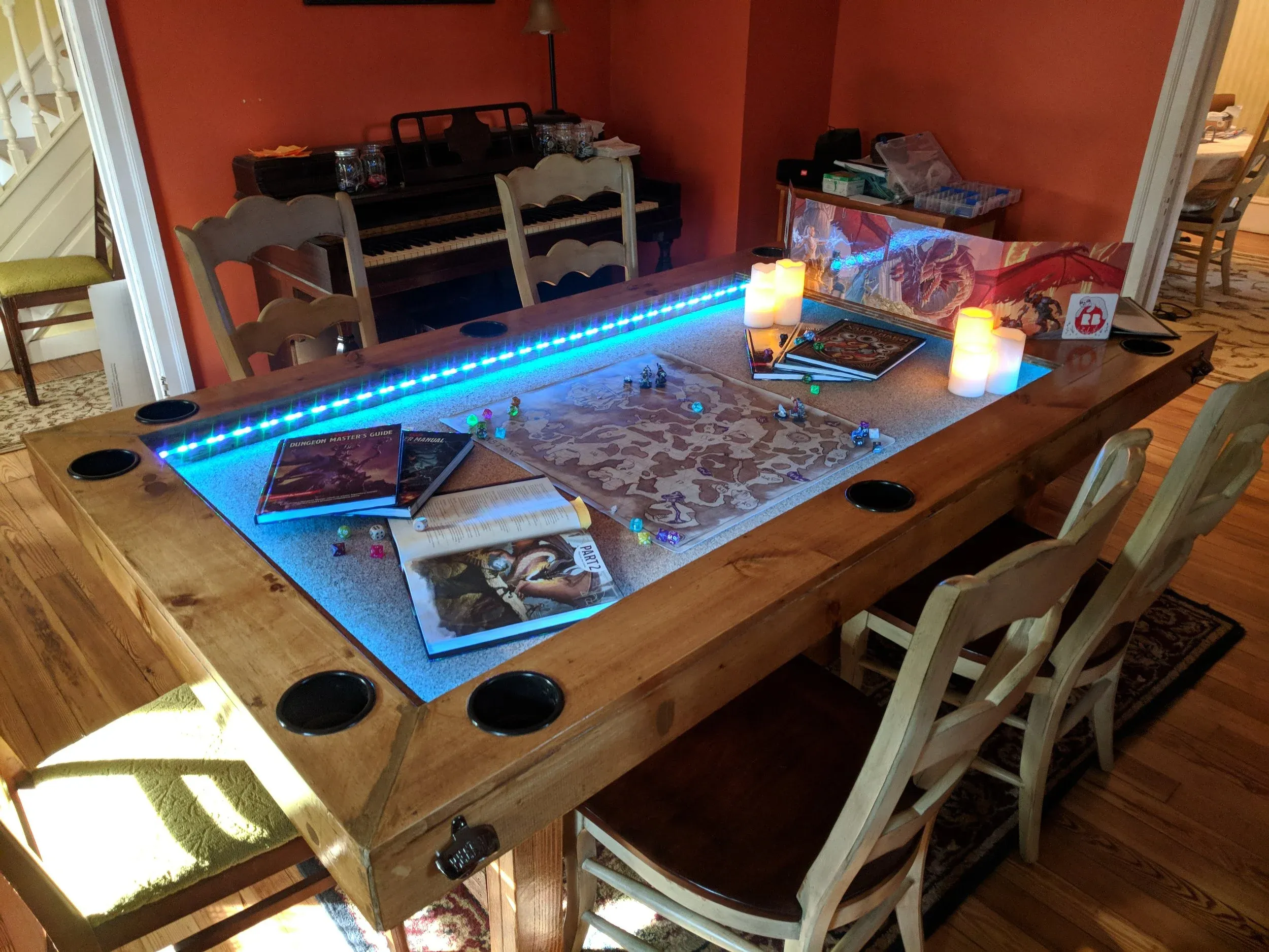 Completed DIY Dungeons & Dragons gaming table with finished woodwork and accessories