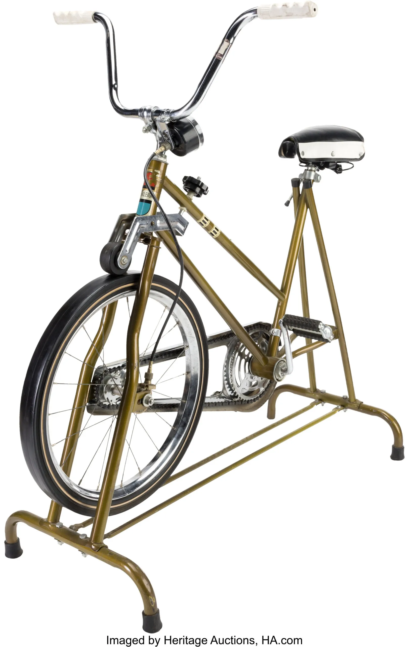 Gold exercise bike once used by Elvis Presley