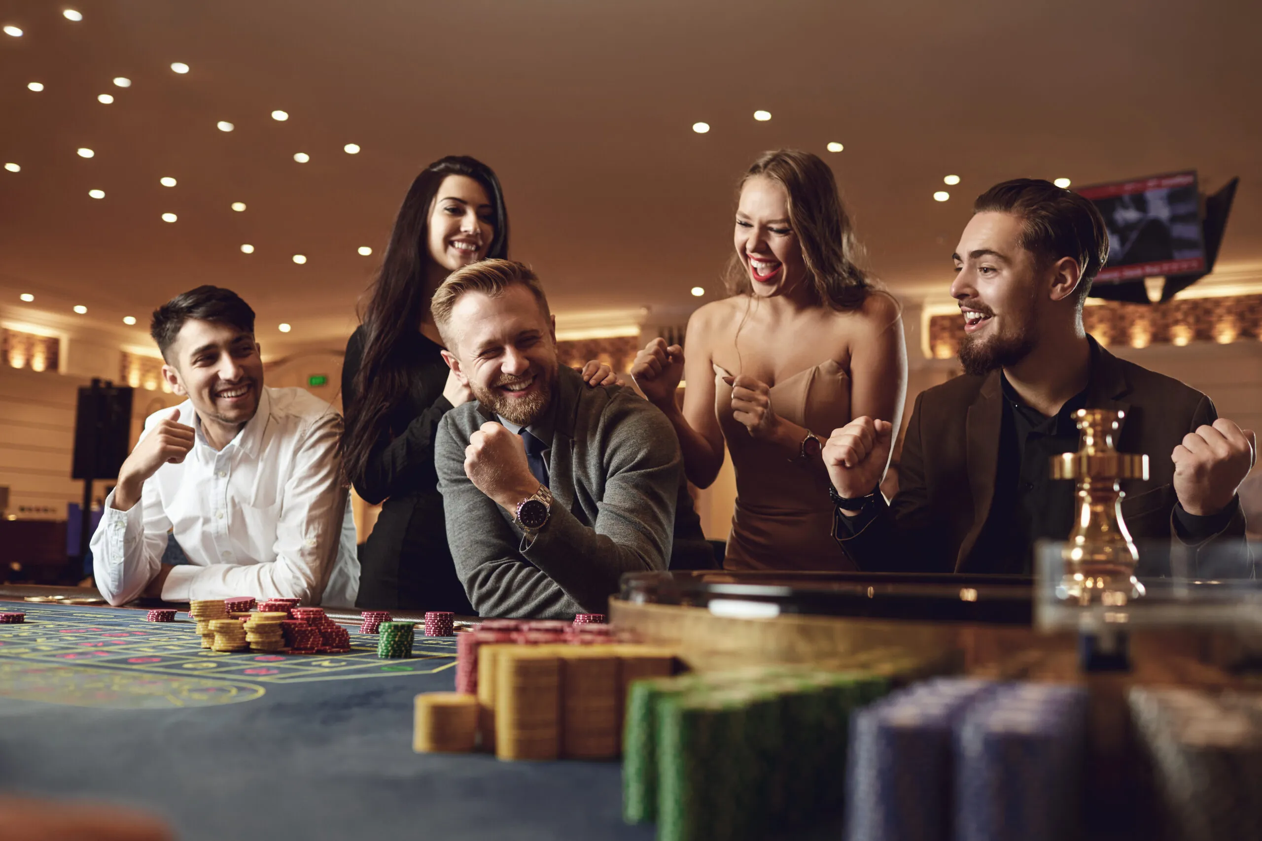 Casino table games with players enjoying a lively gaming atmosphere