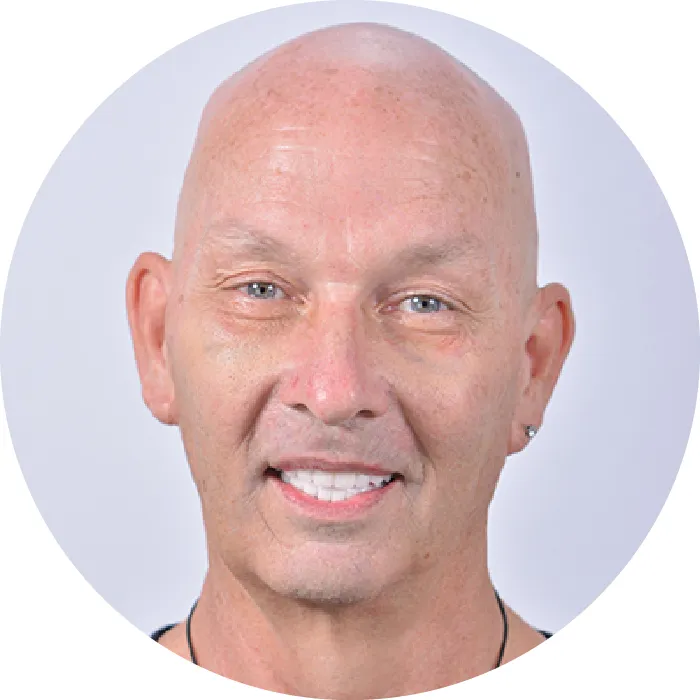 Patient testimonial portrait smiling after treatment