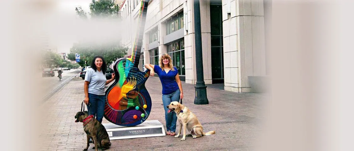 A pet sitter caring for multiple pets in a home environment