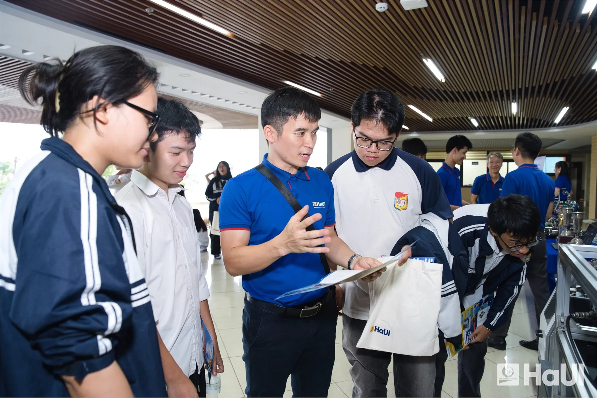High school students participating in hands-on robotics activities