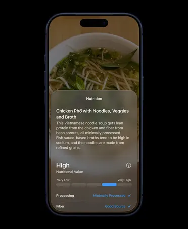 iPhone 17 Pro, Deep Blue, front screen, displays in Siri mode in Camera interface, showing nutrition facts about chicken phở.