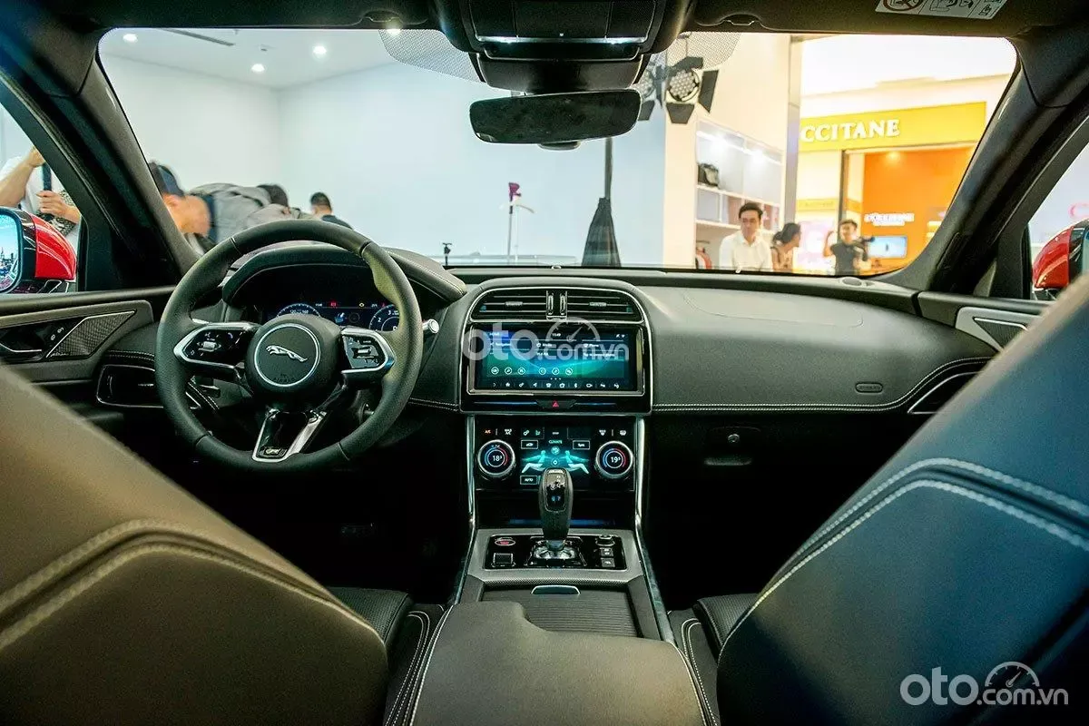 Jaguar XE interior with dual screens and premium cockpit layout