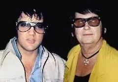 Elvis Presley and Roy Orbison meeting during the Sun Records era, showing mutual admiration between two rock legends