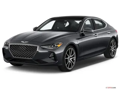 2021 Genesis G70 shown from an angular front view showcasing its sport sedan styling