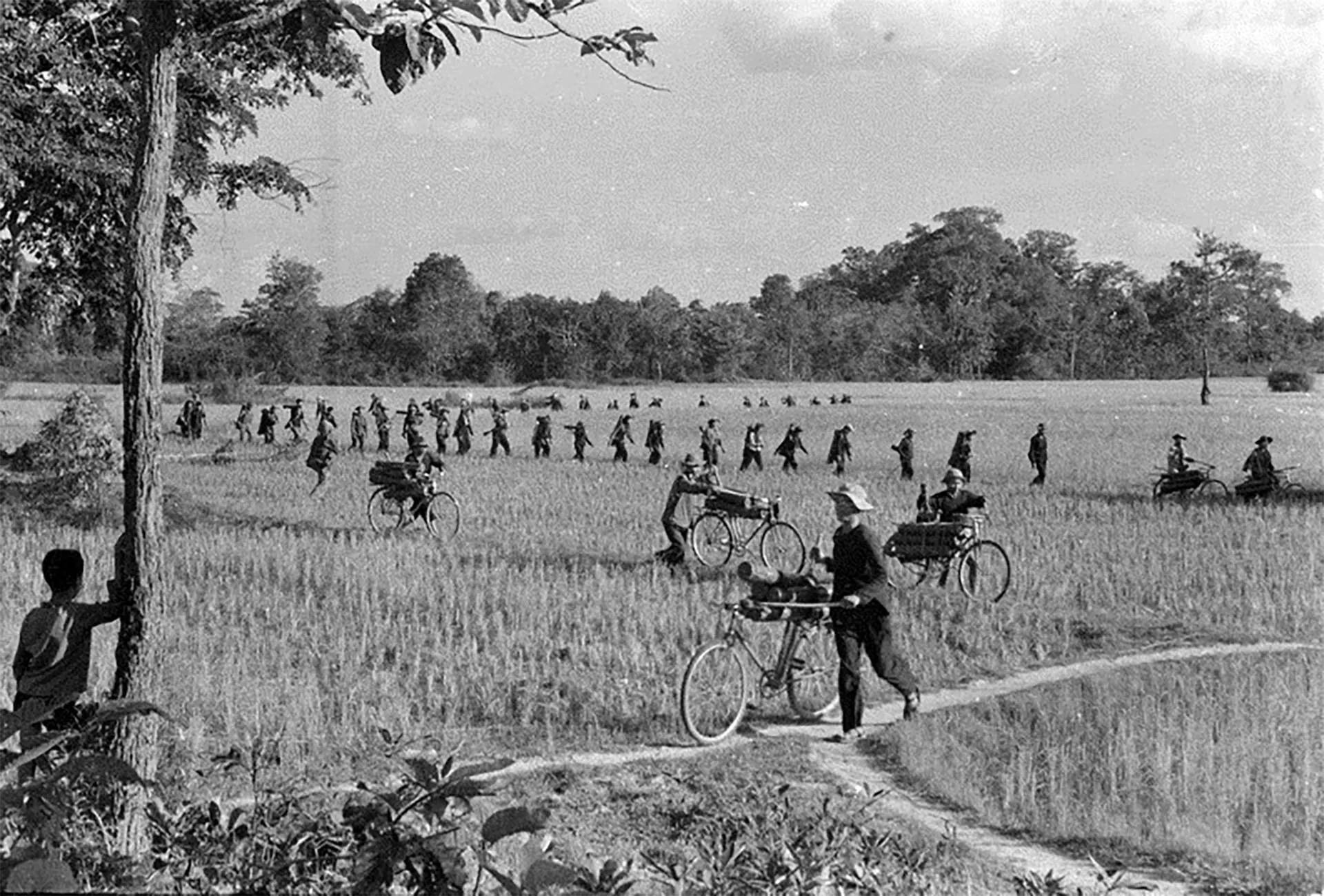Civilians in Tay Ninh transporting ammunition and supplies to the front lines