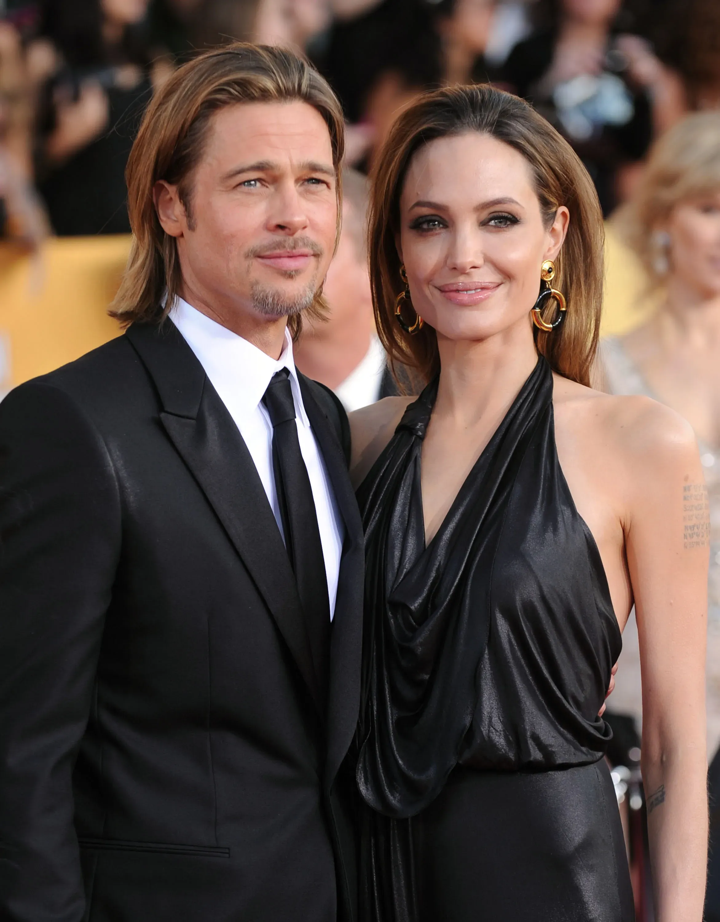Actors Brad Pitt and Angelina Jolie attend The 18th Annual Screen Actors Guild Awards.