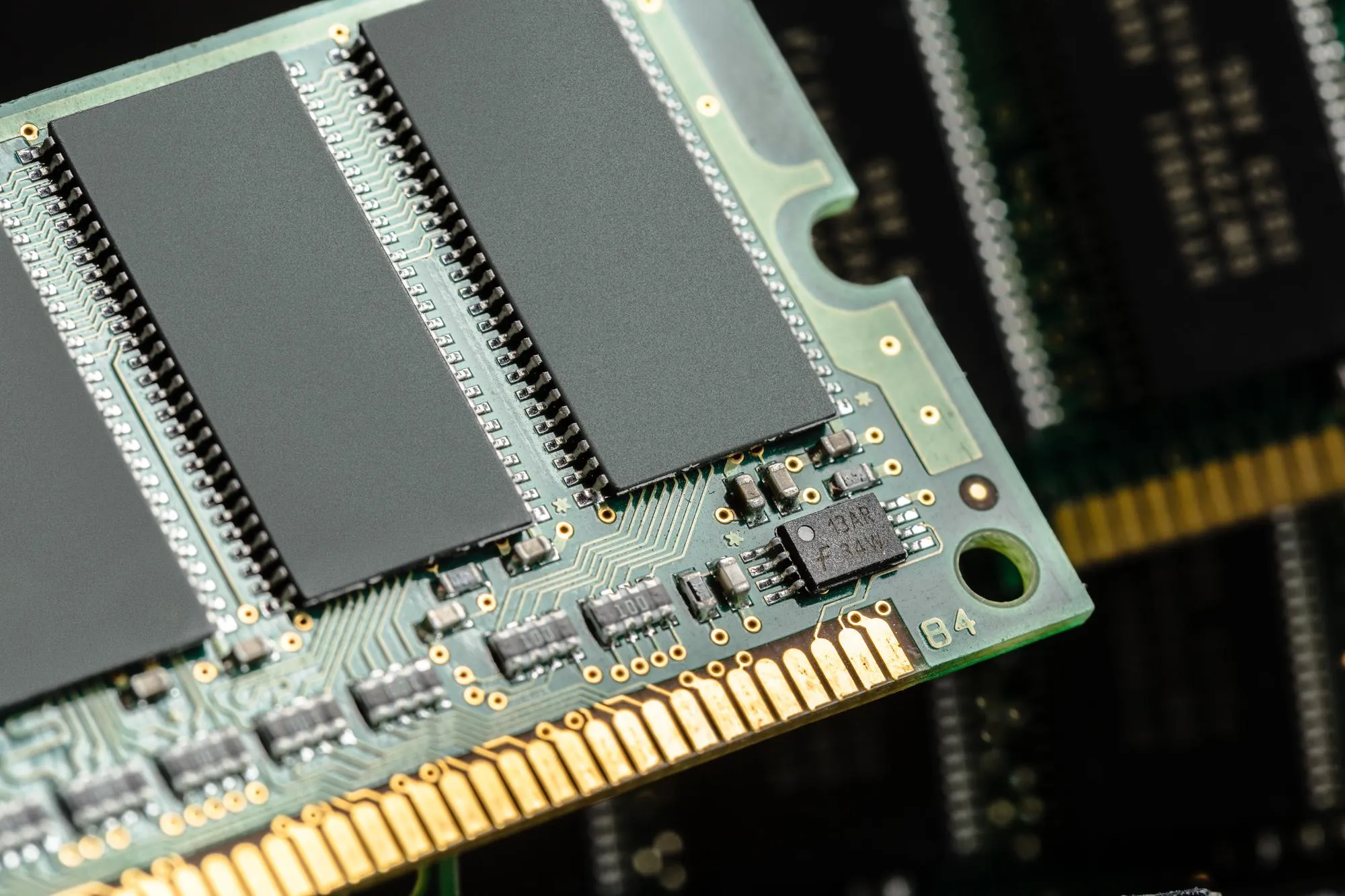 RAM memory modules being installed into a computer's memory slots