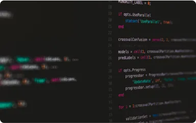 Computer screen displaying code, representing the technical writing workflows supported by Overleaf