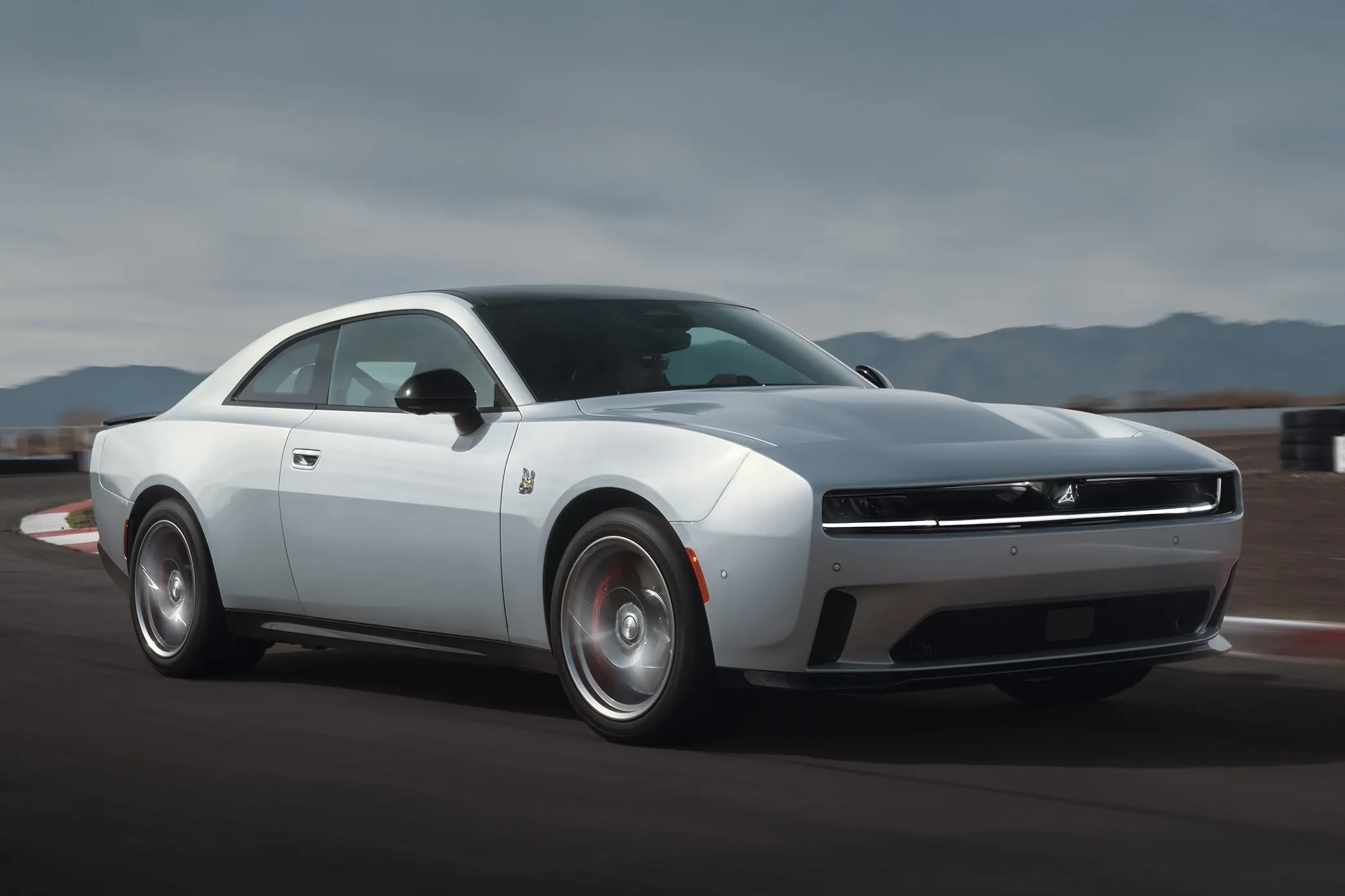 Front three-quarter view of the all-electric Dodge Charger Daytona R/T in aggressive stance
