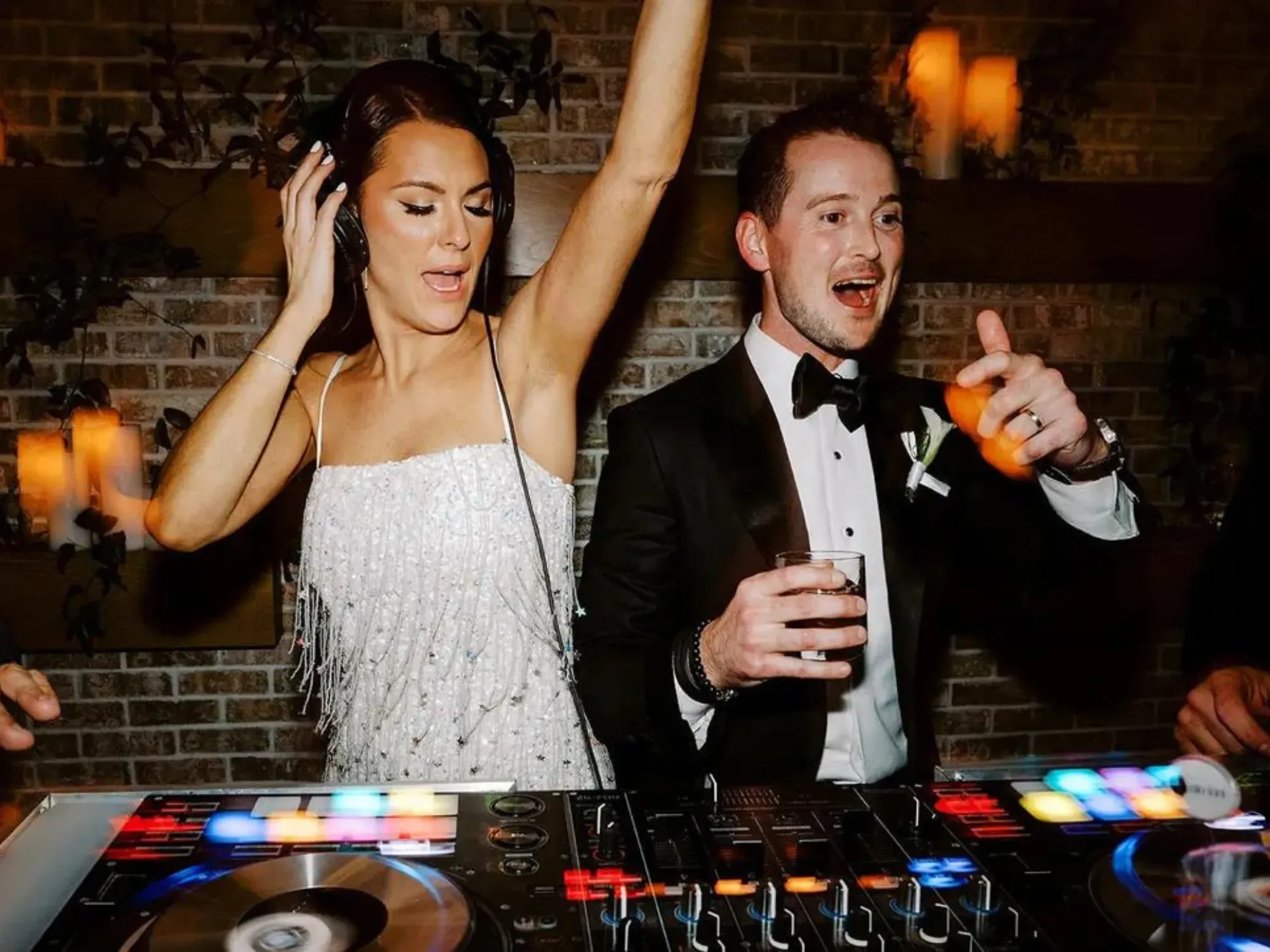 Wedding DJ setup with lighting and sound equipment ready for a reception celebration