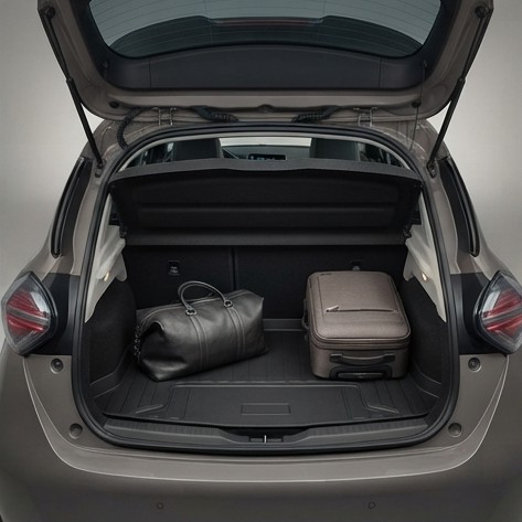 Open boot of an electric hatchback showing reduced cargo space due to underfloor battery packaging