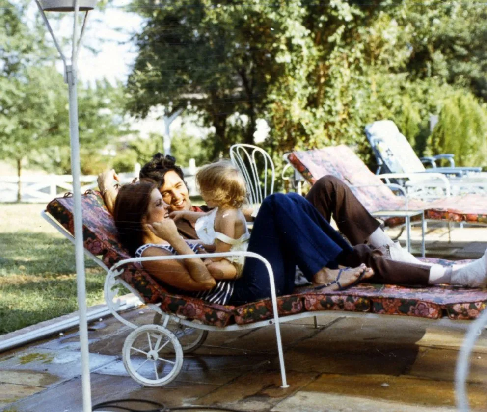 Elvis Presley pictured with his family in an intimate personal moment