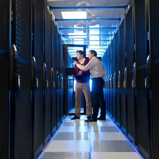 Modern data center facility with server racks and cooling infrastructure