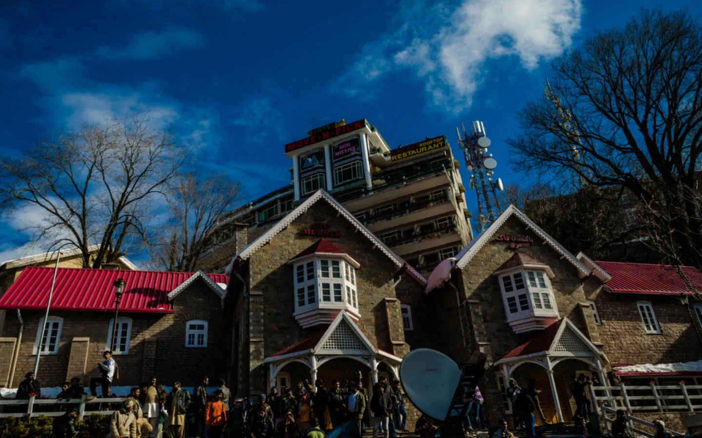 Murree hill station town view with colonial-style buildings and forested mountains