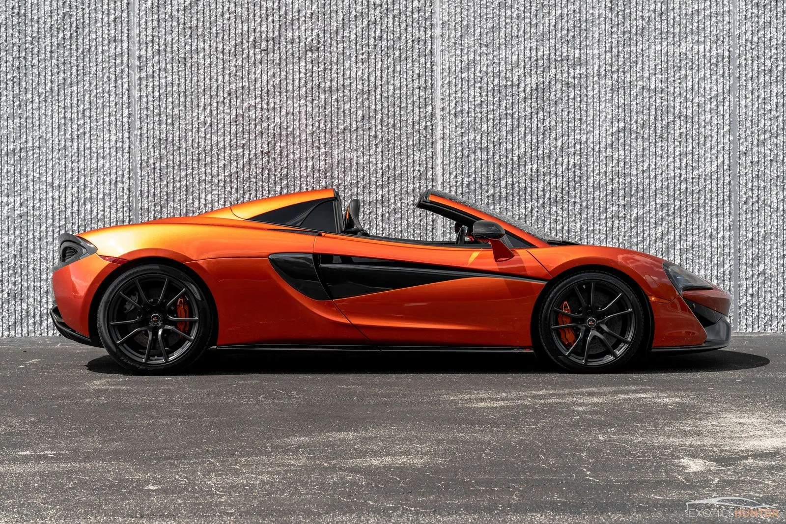 McLaren 570S on a winding road showcasing its driving dynamics