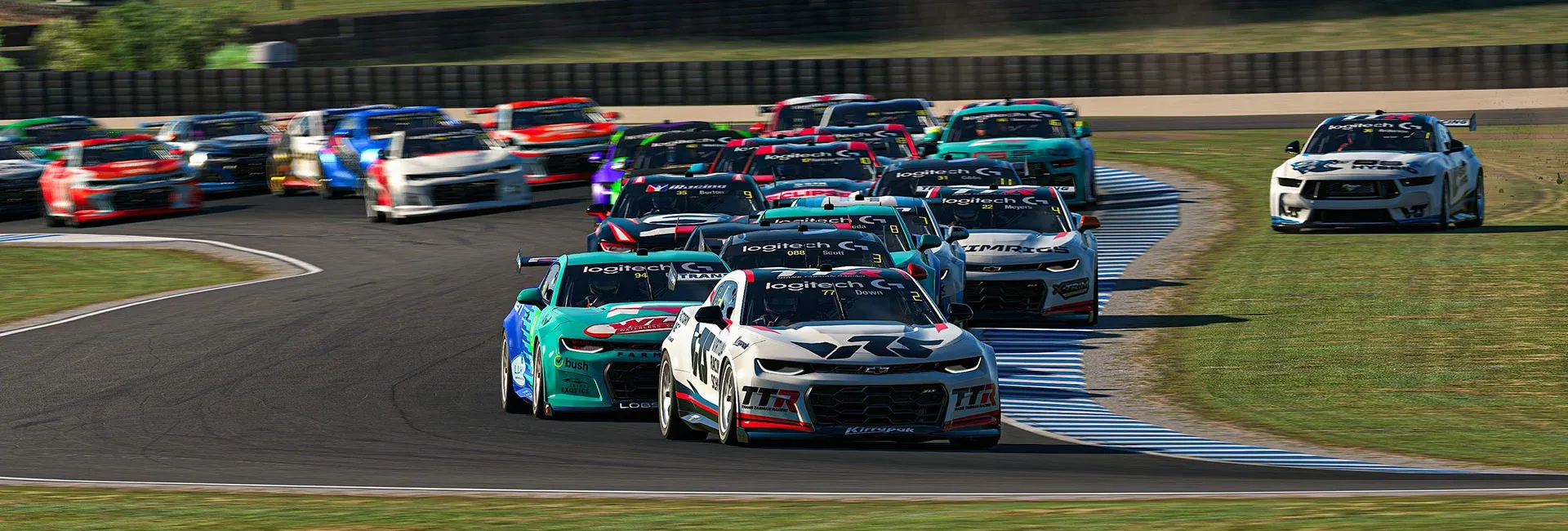 Sim racing cars battling on the opening lap at Phillip Island