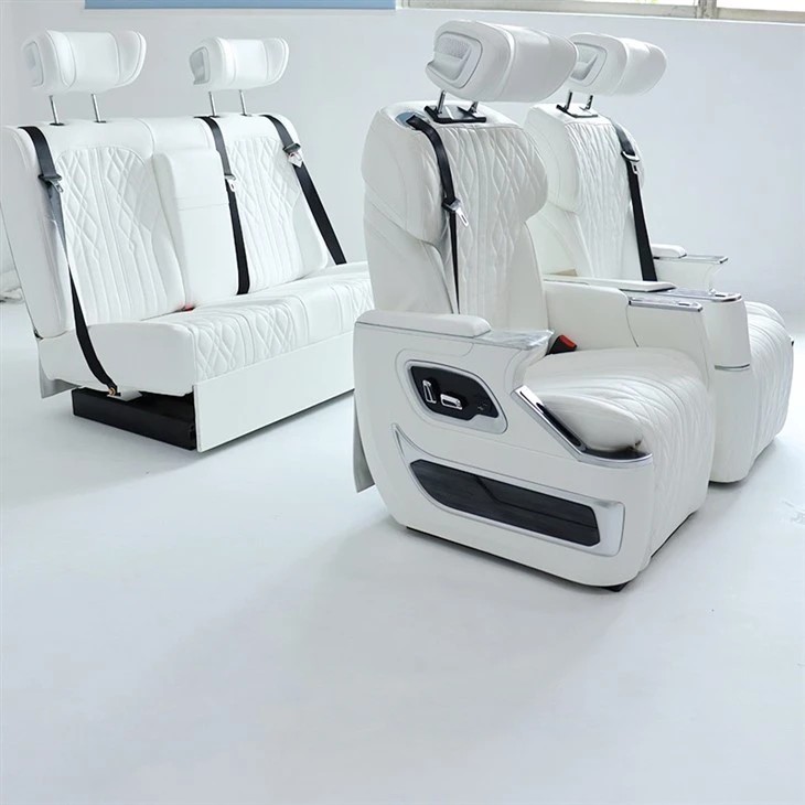 Luxurious MPV interior featuring plush leather captain seats, panoramic glass roof, and executive passenger amenities