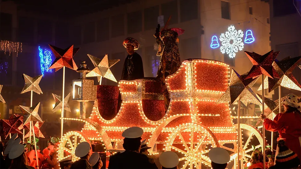 A colorful parade float celebrating the Three Kings in Valladolid, Spain