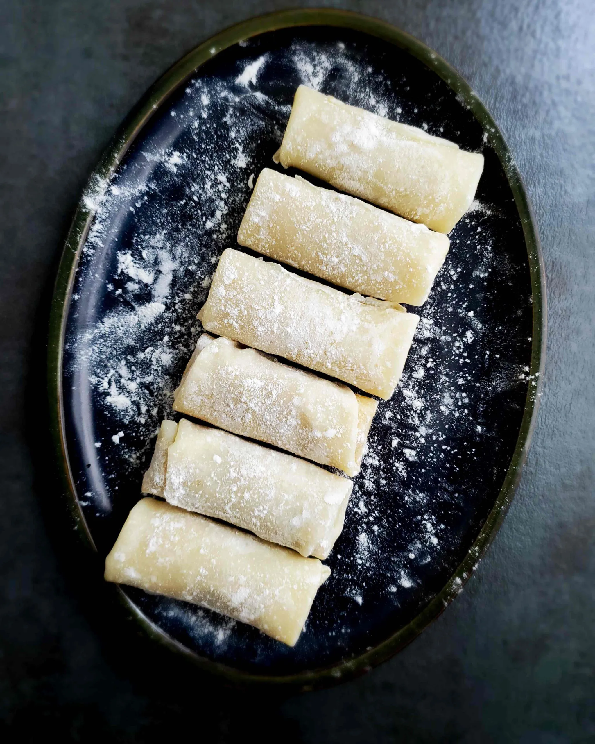 Golden fried fish rolls coated in crispy breadcrumbs
