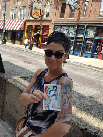 Tattoo planning and design consultation showcasing Elvis jumpsuit-inspired patterns discussed with artist Walter Frank