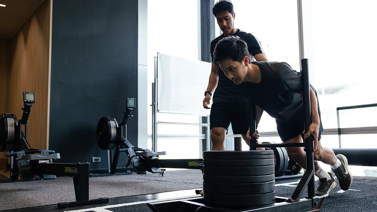 Group fitness class in a modern gym training area