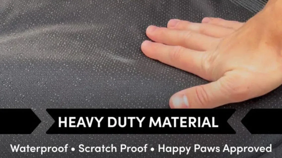 Close up of heavy duty waterproof seat cover material showing scratch resistant surface ideal for dogs in Subaru Forester.