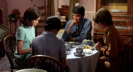 Elvis Presley and Mary Tyler Moore sharing a quiet dramatic moment