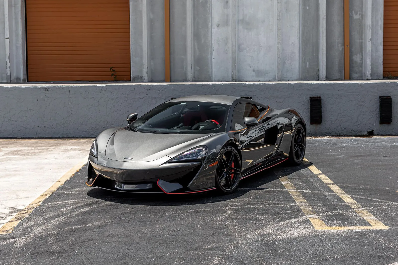McLaren 570S engine bay showing the twin-turbo V8 powertrain