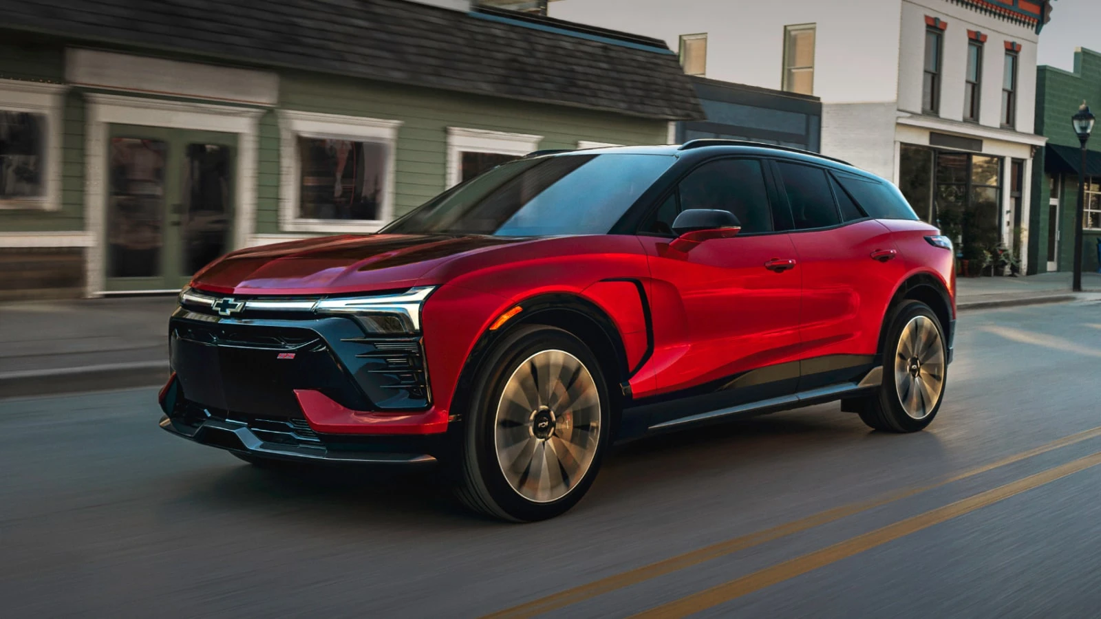 Sleek modern electric SUV parked on a urban street during golden hour with clean minimalist architectural background