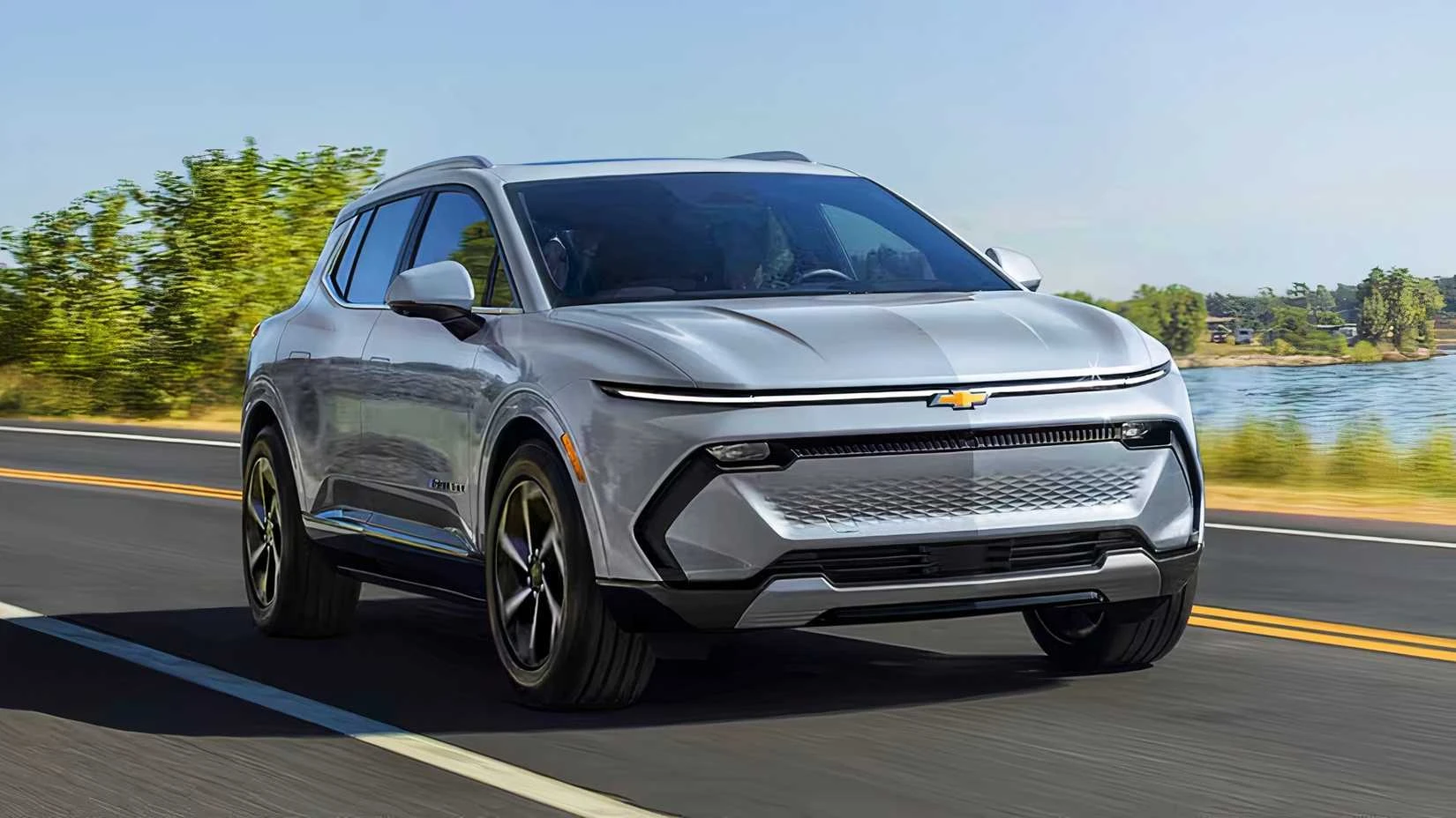 A mainstream electric SUV cruising on an open highway, illustrating long-range performance among 2022 electric SUV competitors