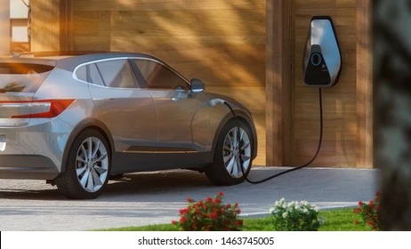 Several 2022 electric SUV models parked side by side in a lot, illustrating price and range differences across the class